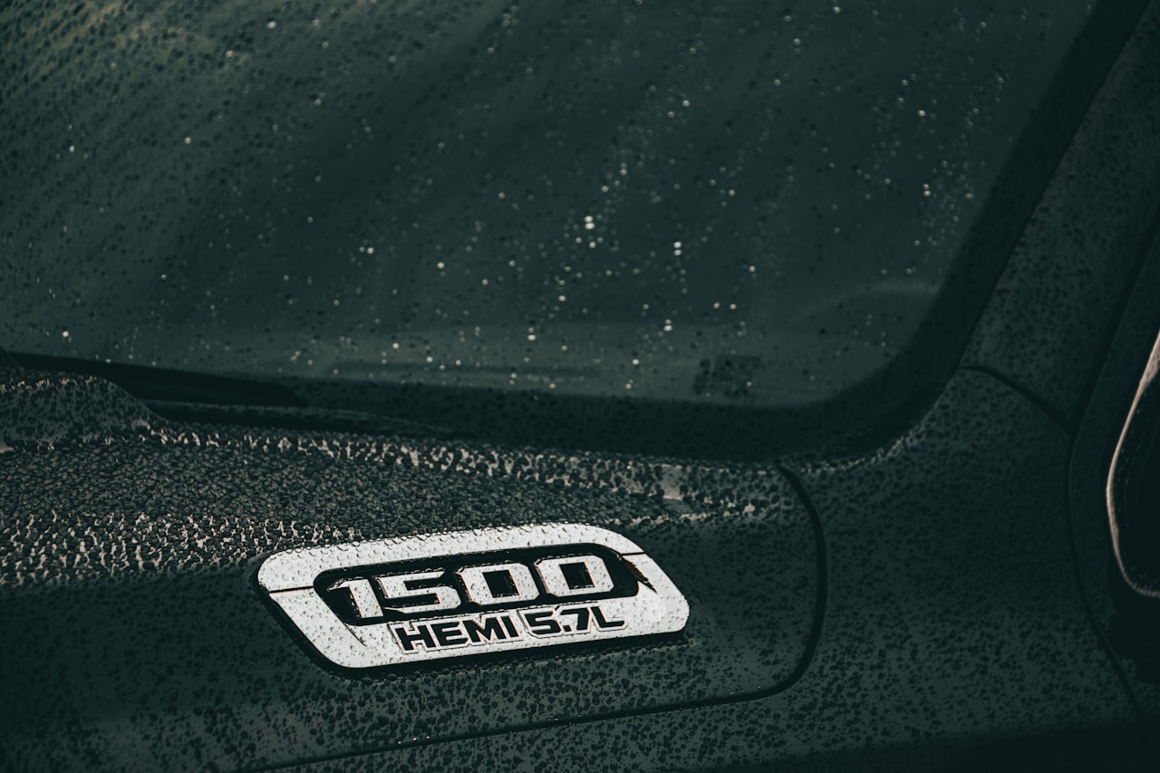 Close-up of a Ram 1500 HEMI 5.7L engine badge